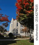 old university building in fall colours