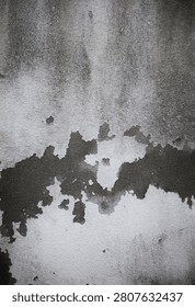 An old, unsightly cement wall surface
