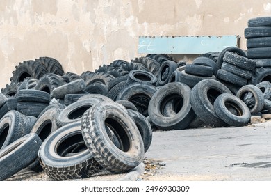 old and unusable truck and tractor tires in the scrapyard - Powered by Shutterstock