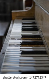 Old Upright Piano With Missing Keys