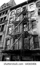 Old Urban Building With Fire Escape In New York , Monotone