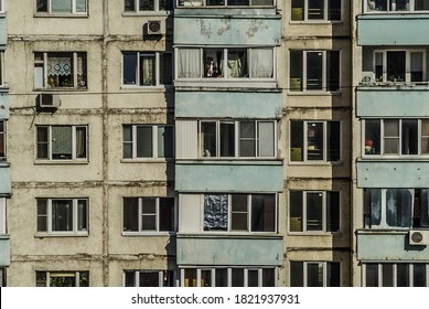 Old Urban Obsolete Facade Of Block-panel House. Outdated Typical Block Multistory Residential Building.