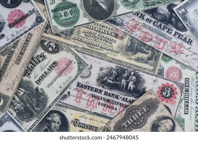 Old US dollar banknotes and silver certificates banknotes background