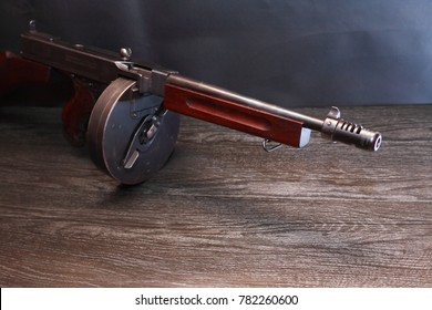 Old USA submachine gun closeup on dark background