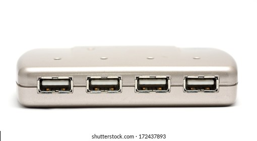 Old USB hub placed on a white background.