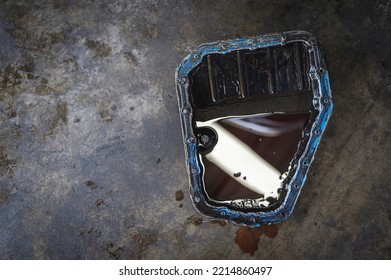 Old used car automatic transmission oil pan. - Shutterstock ID 2214860497