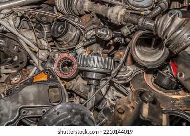 Old Used Car Parts And Other Parts In A Pile