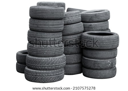 old used car tire stack pile isolated on white background
