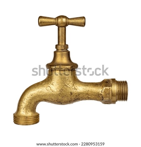 Old used golden copper metal vintage faucet isolated on white background