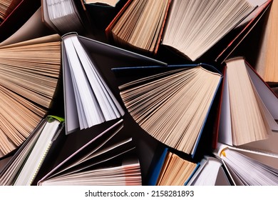 Old And Used Hardcover Books Or Textbooks Seen From Above. Books And Reading Are Essential For Self-improvement, Knowledge Acquisition And Success In Career, Business And Personal Life.