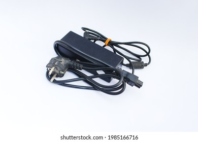 Old Used Laptop Charger Isolated On White Background.