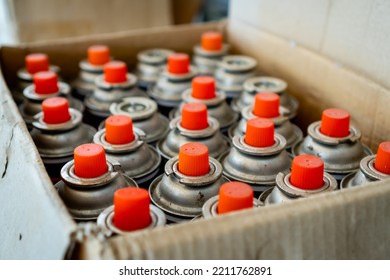 Old And Used Lubricant Spray Cans From Automotive Industry Wait For Recycling.