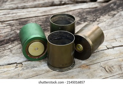 Old And Used M203 Bullet Shells On Wooden Floor, Soft And Selective Focus.