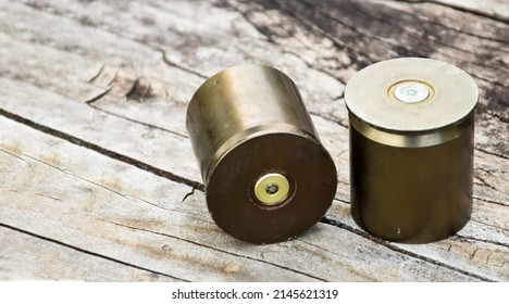 Old And Used M203 Bullet Shells On Wooden Floor, Soft And Selective Focus.