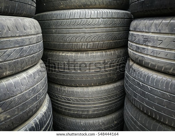 Old used tires\
stacked for textured\
background