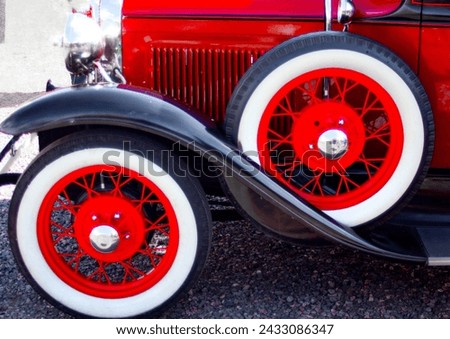 Old vehicle in red with black accents