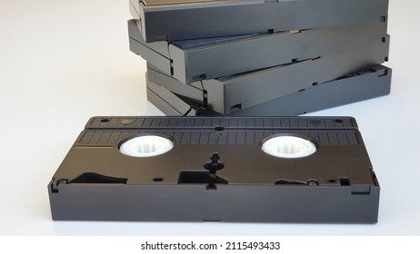 Old VHS Video Tapes On White Background.