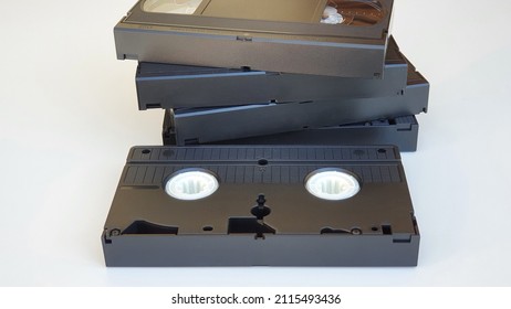 Old VHS Video Tapes On White Background.