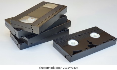 Old VHS Video Tapes On White Background.