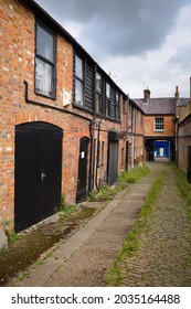 An old Victorian cobbled back-yard street in Tring, Hertfordshire, England.
