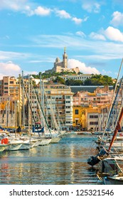 The old Vieux port of Marseille with Notre Dame de la Garde at back