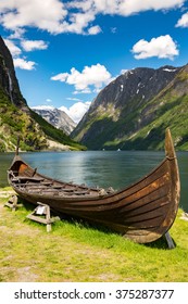 Old Viking Boat Replica In A Norwegian Landscape Near Flam, Norway.