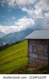 An Old Village House And Kaçkar Mountains On The Gito Plateau In The Black Sea Region