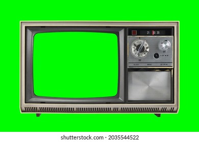 Old Vintage 1970s TV With Green Screen For Adding Video Isolated On Green Background.Vintage TVs 1960s 1970s 1980s 1990s 2000s. 