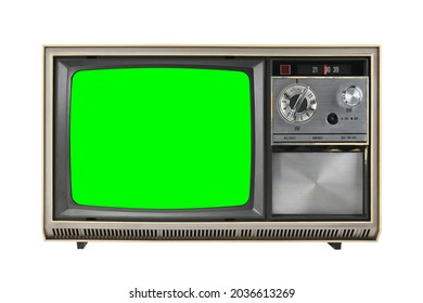 Old Vintage 1970s TV With Green Screen For Adding Video Isolated On White Background.Vintage TVs 1960s 1970s 1980s 1990s 2000s. 