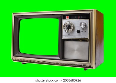 Old Vintage 1970s TV With Green Screen For Adding Video Isolated On Green Background.Vintage TVs 1960s 1970s 1980s 1990s 2000s. 