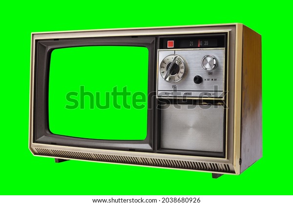 Old vintage 1970s TV with green screen for adding video\
isolated on green background.Vintage TVs 1960s 1970s 1980s 1990s\
2000s. 