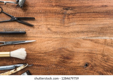 Old vintage barbershop tools on wooden table - barbershop background with copy-space - Shutterstock ID 1284679759