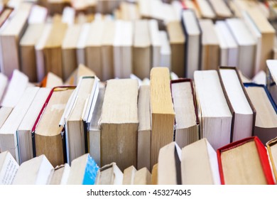 Old Vintage Books On A Counter Of Secondhand Bookshop