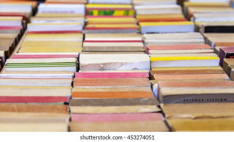 Old Vintage Books On A Counter Of Secondhand Bookshop