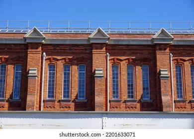 Old Vintage Brick Building. Close Up Of A Traditional English Railway Station Building. 