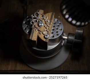 Old vintage brooch on jeweller workplace background, accent retro jewelry for women - Powered by Shutterstock