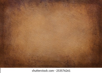 Old vintage brown leather texture closeup can be used as background
