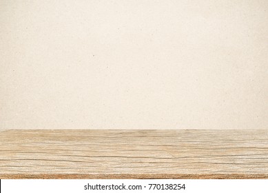 old vintage brown wood panel tabletop with plain paper texture tan sepia color background for show or advertise and promote products on display .