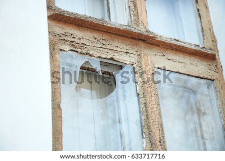 Old vintage building with broken glass