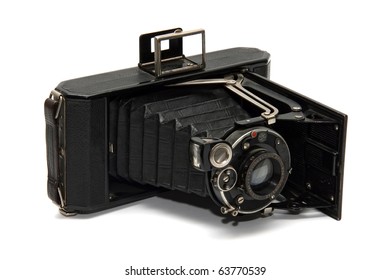 Old vintage camera on white