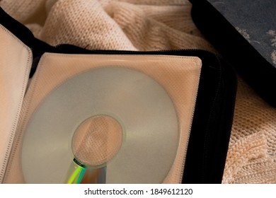 An Old Vintage Cd Case With A Cd In It