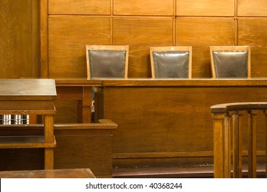 Old Vintage Court Room. Close-up Of The Judges Chairs.