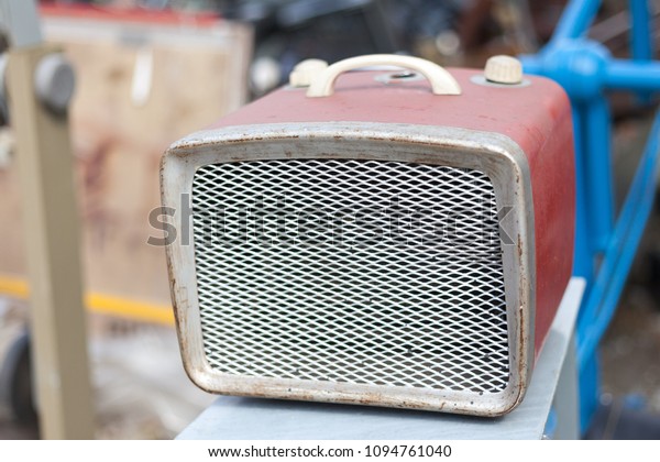 old\
vintage equipment, radio, speakers or fan\
heater