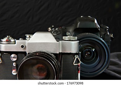 Old Vintage Film Camera On Background Of Digital Camera