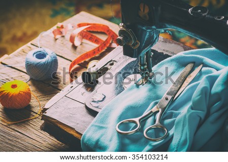 Old vintage hand sewing machine. Selective focus