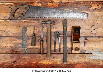 Old Vintage Hand Tools On Wooden Background