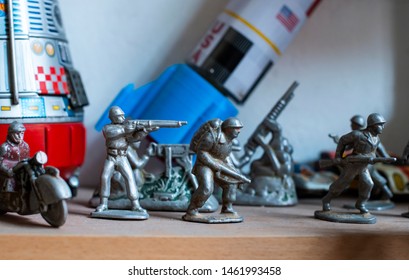 Old Vintage Lead Soldiers Toys On Shelf. Collection Of Vintage Toys In A Shop. Bright Colours.