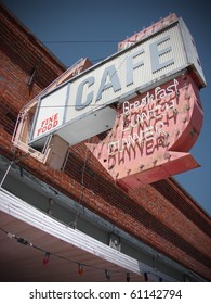 Old Vintage Neon Cafe Sign On Abandoned Business