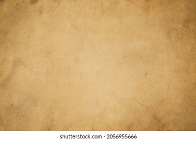 Old vintage paper texture. Brown background. Rustic wallpaper. Retro image