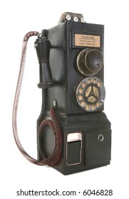 An Old Vintage Pay Phone Isolated Over White